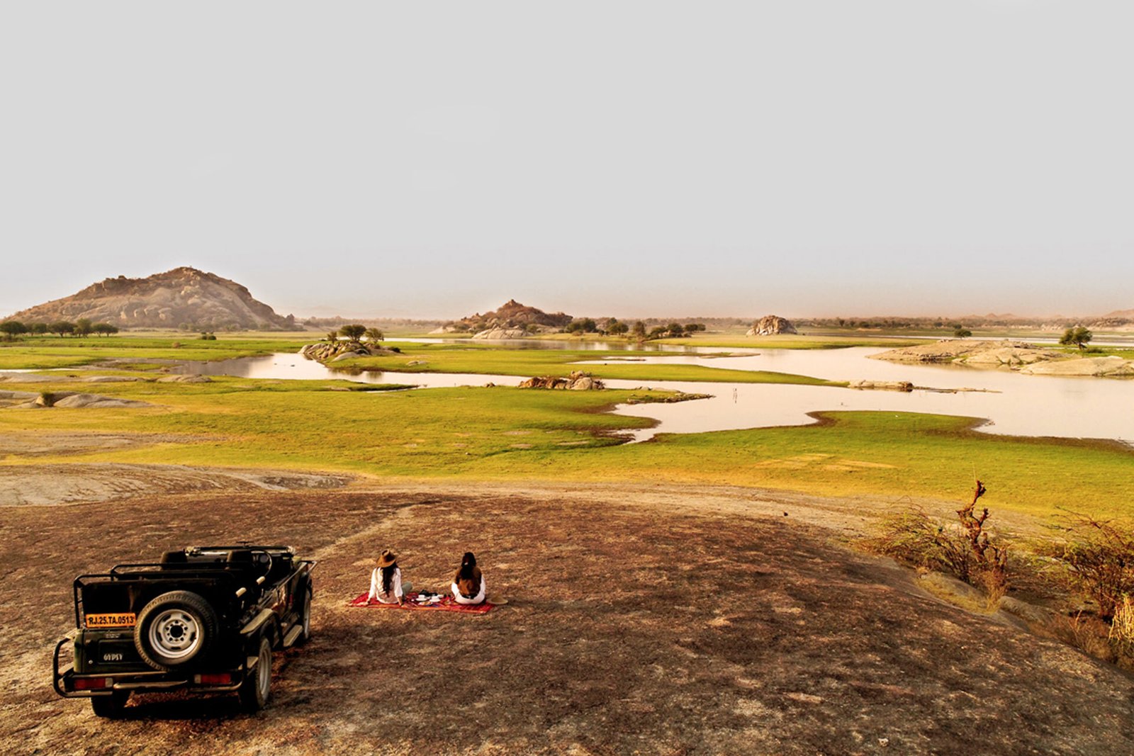 Guests picnicking on the Jawai Dam backwaters